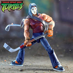 TMNT Ultimates Wave 13 action figure with white mask blue hair and red sleeveless torso in dynamic pose