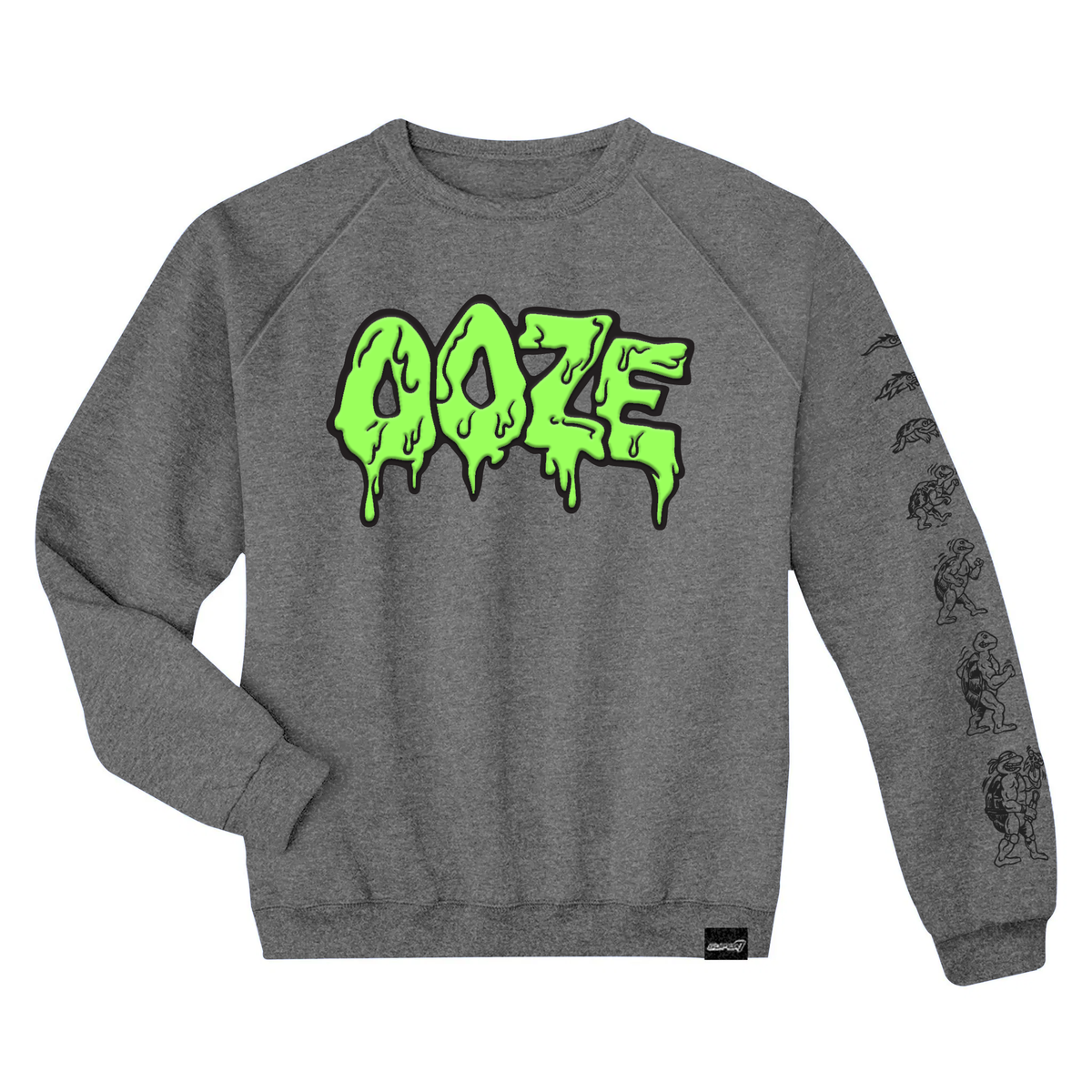 Gray TMNT crewneck sweatshirt with glowing green Ooze text on the chest and ninja silhouettes on the sleeve